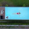 Modulares Schwimmbecken mit den Maßen 6,2 m x 2,5 m mit Gegenstromanlage, Sportbereich und Spa.