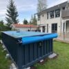 Modulares Schwimmbecken mit den Maßen 6,2 m x 2,5 m mit Gegenstromanlage, Sportbereich und Spa.